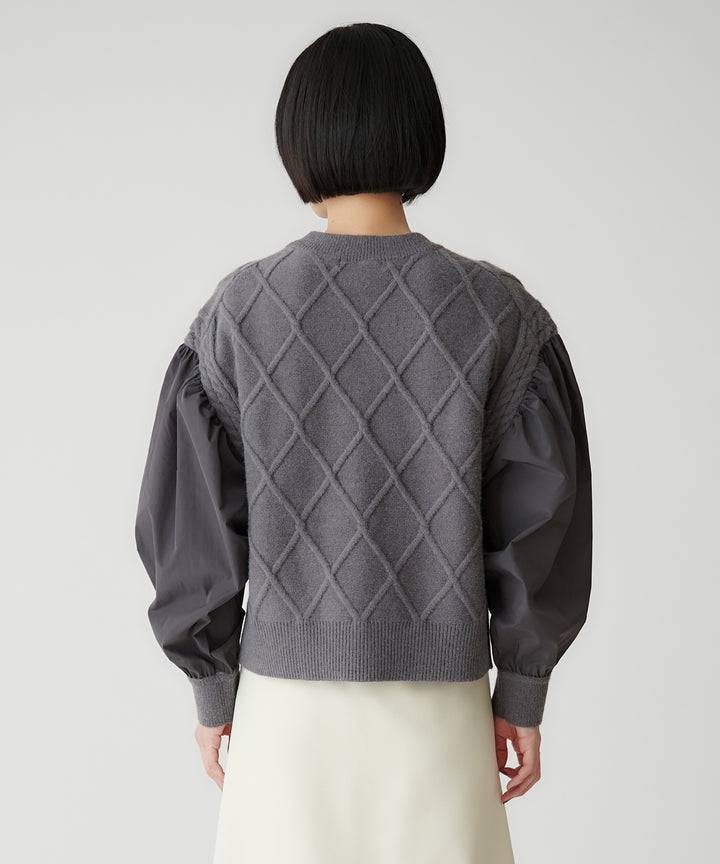 ケーブル×布帛スリーブ異素材ニット