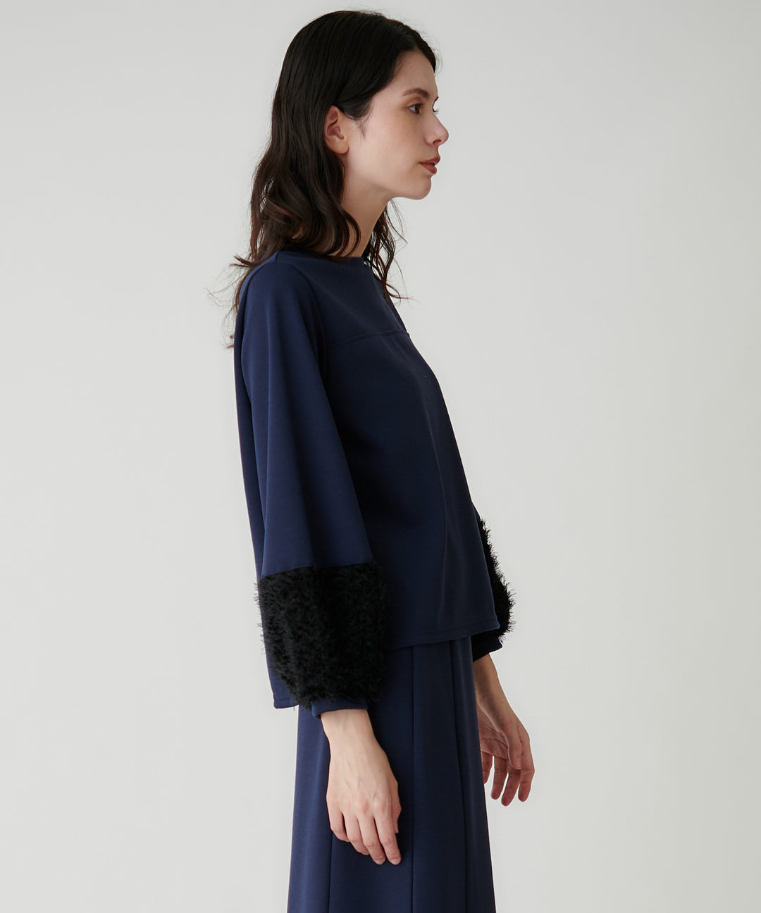 フェザースリーブポンチトップス