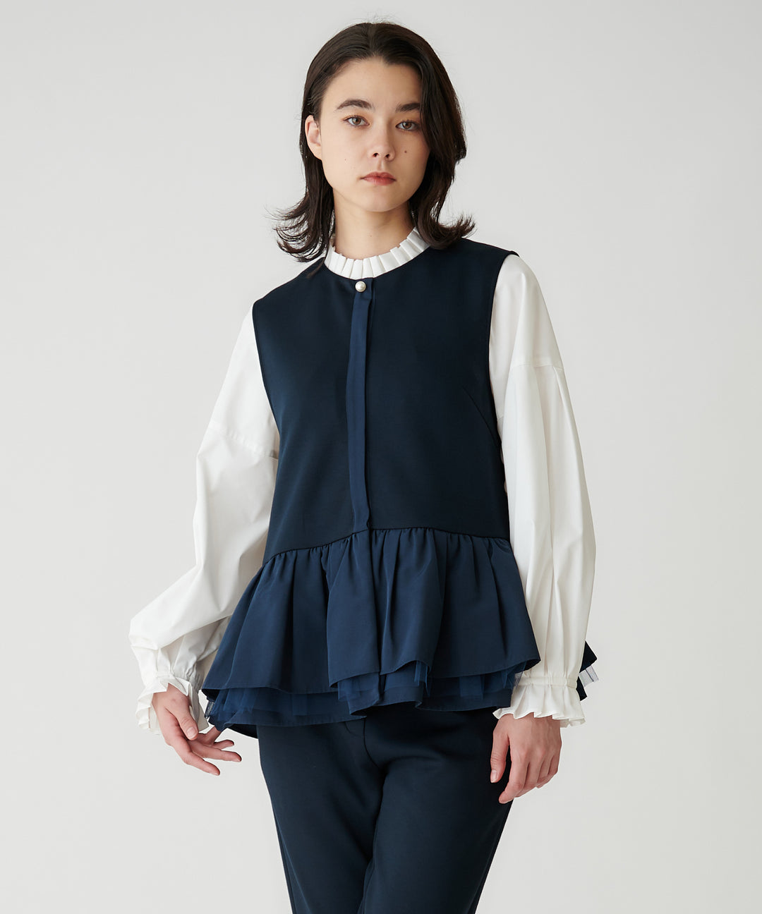 パール釦ペプラムベスト