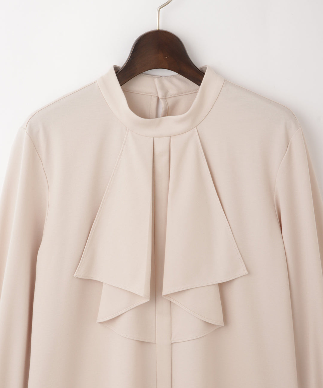 ペプラムフリルカットソー