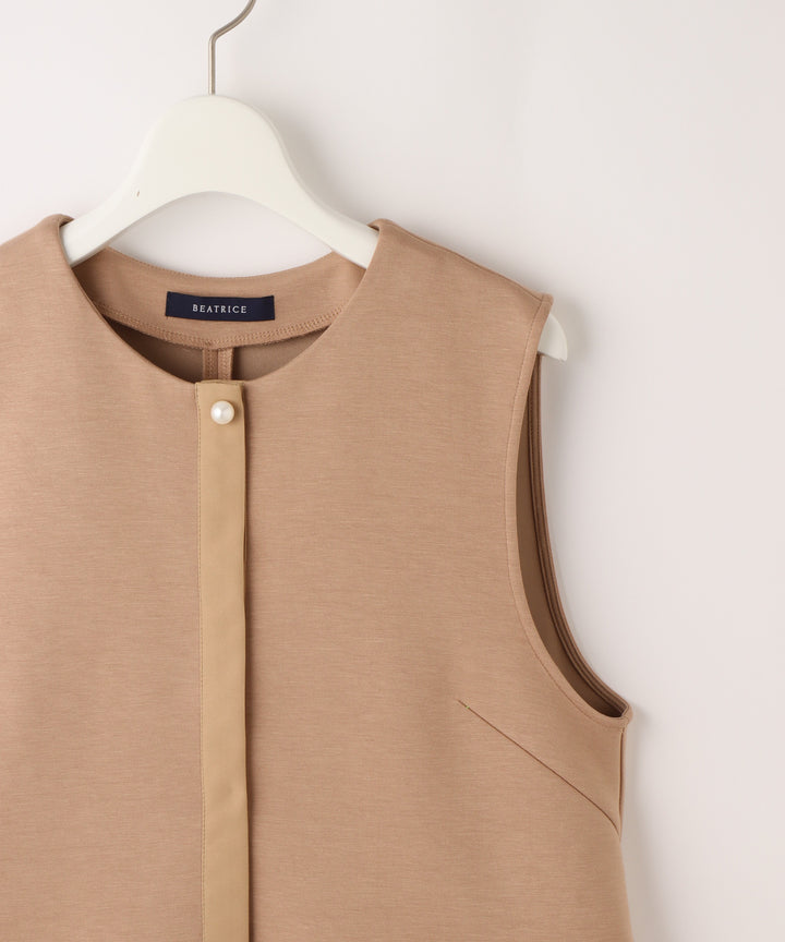 パール釦ペプラムベスト