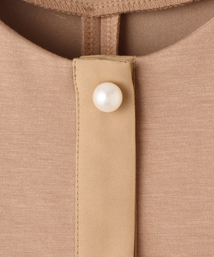 パール釦ペプラムベスト