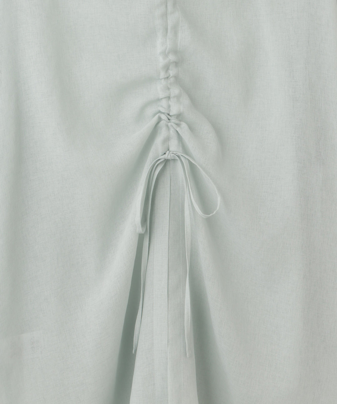 バックリボンシアーシャツ