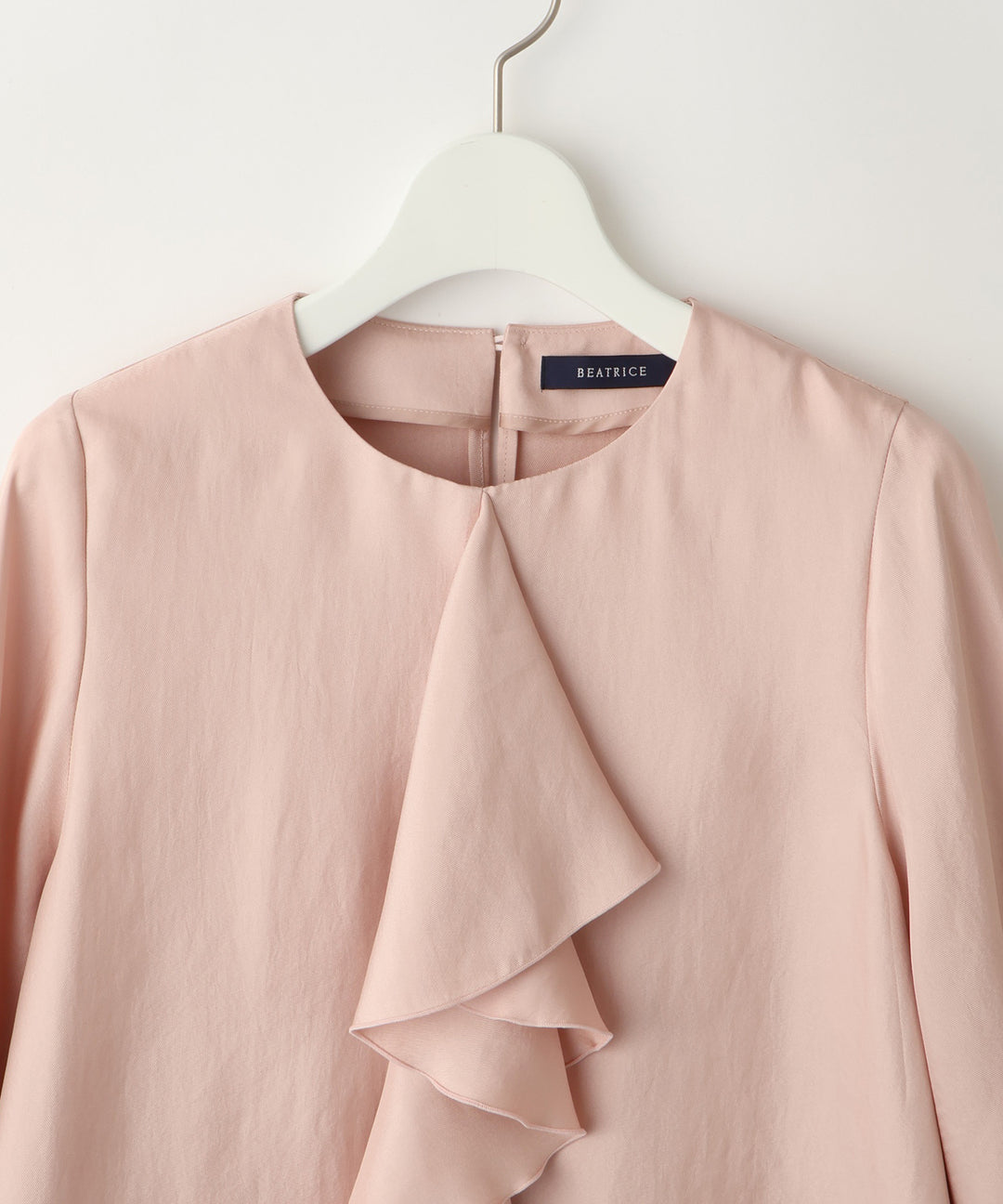 ラッフルデザインブラウス