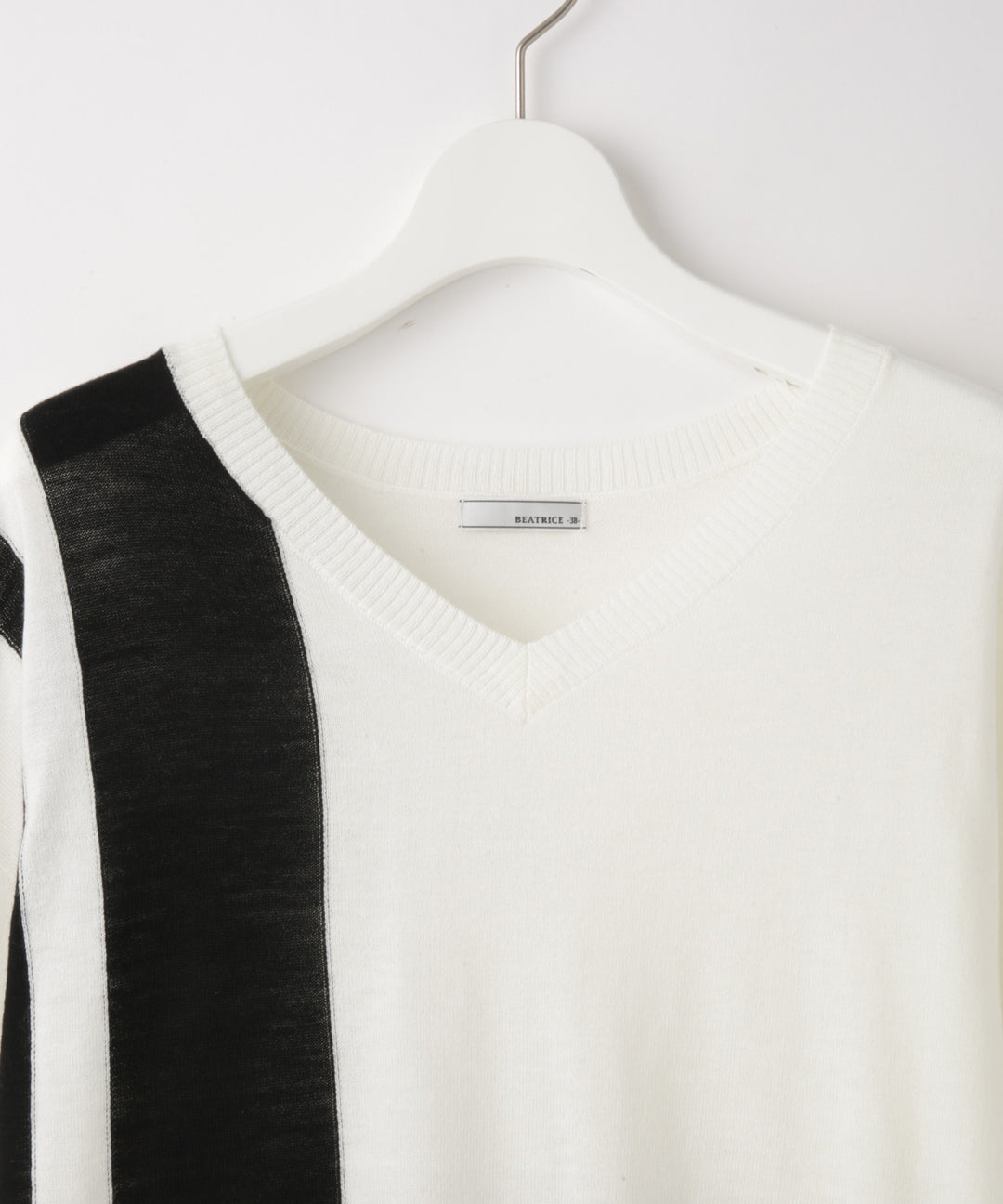 幾何学ラインクルーネックニット