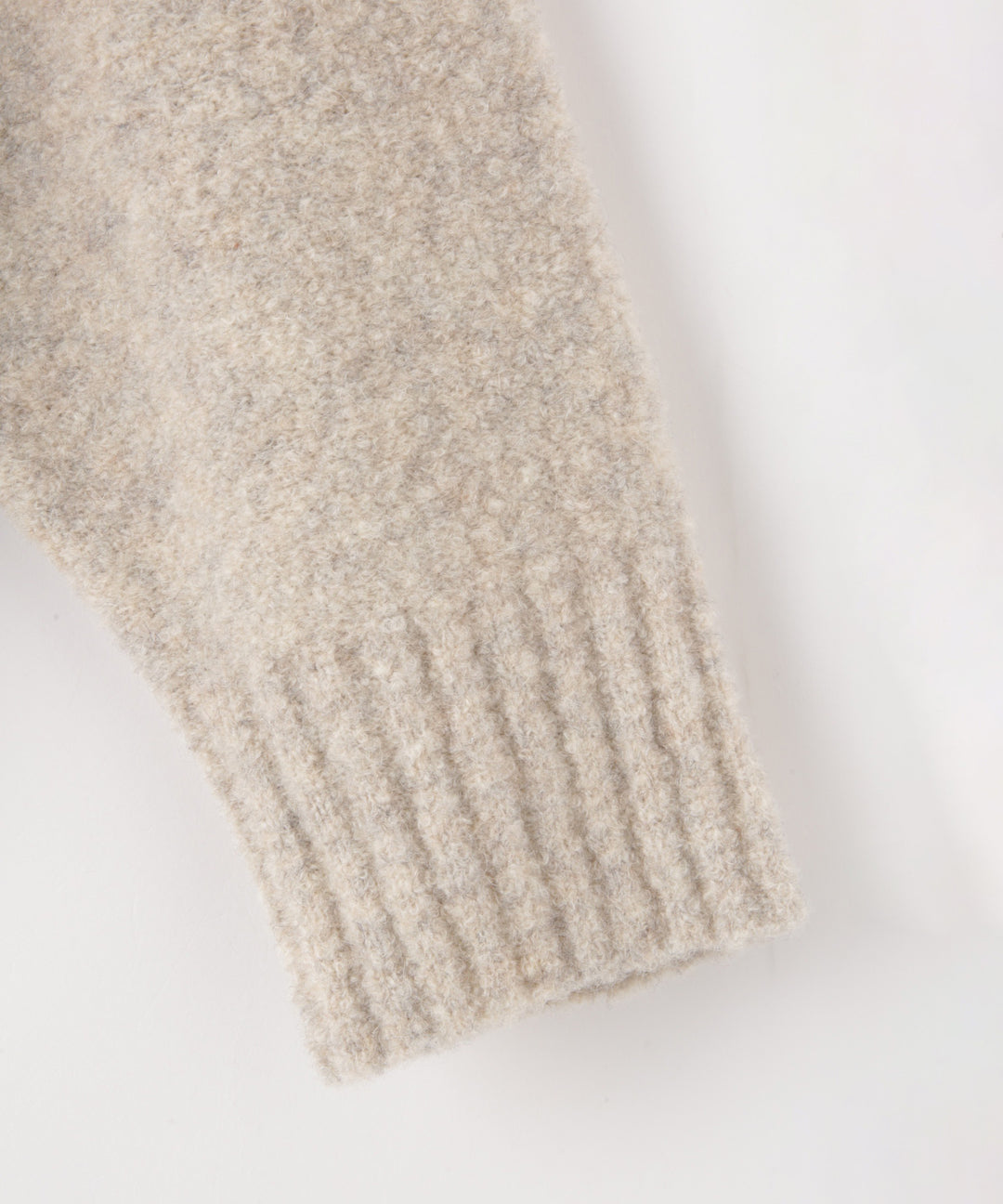 ウール混ブークレフリースニット