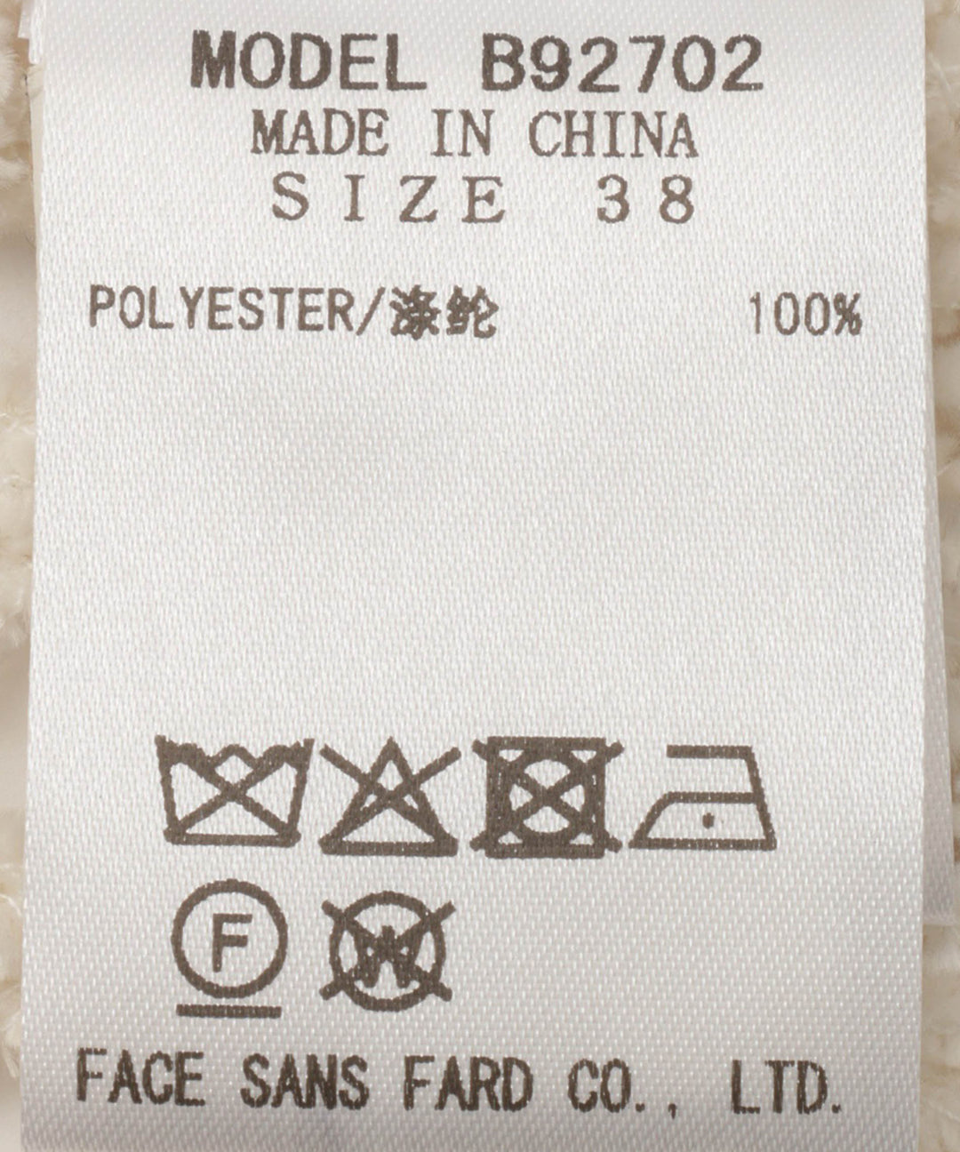 サークル刺繍アシンメトリーデザイントップス